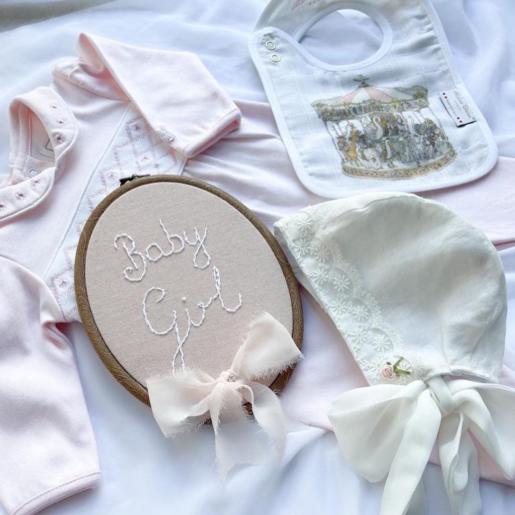 ISADORA Embroidery Design. Pink Fabric, Ivory Embroidery & Pink Chiffon Bow.