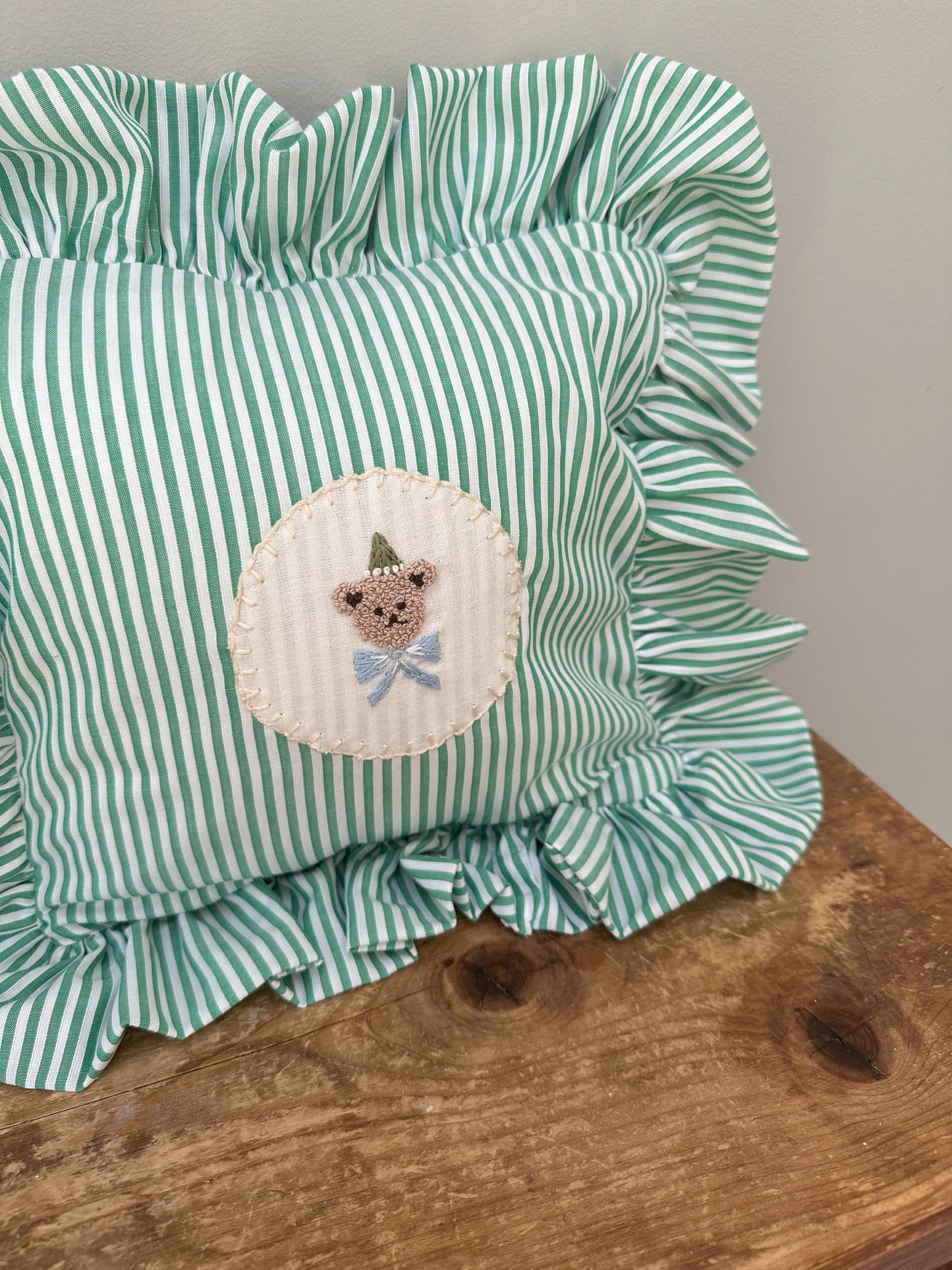 Small Handmade Green Pinstripe Childrens Cushion with Hand Embroidered Bear