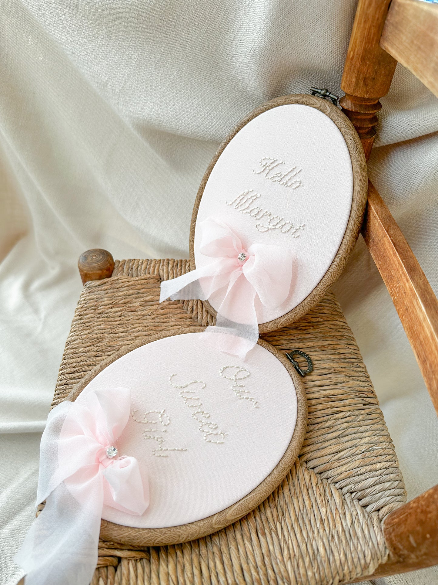ISADORA Embroidery Design. Pink Fabric, Ivory Embroidery & Pink Chiffon Bow.