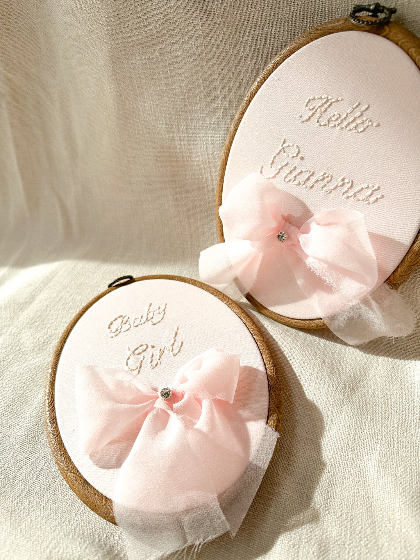 ISADORA Embroidery Design. Pink Fabric, Ivory Embroidery & Pink Chiffon Bow.