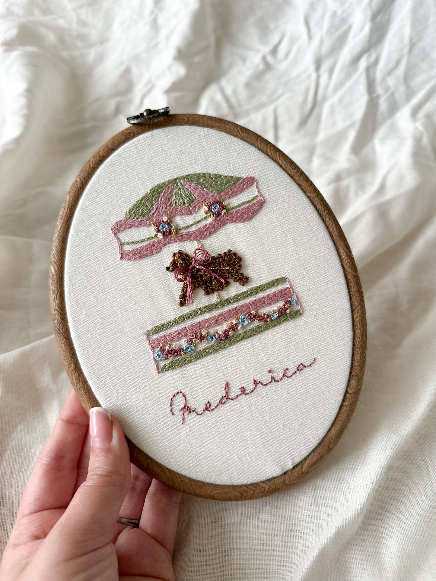 “Happy Hearts Carosel” Hand embroidered keepsake.